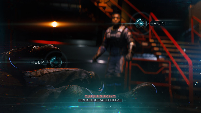 A figure lies prone in the foreground as a person who is out-of-focus looks on. Overlaid text reads. 